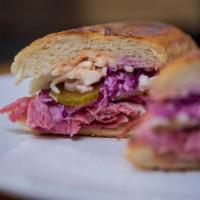 Reuben Italiano Sub · Sy Ginsberg corned beef, red cabbage slaw, pickles, shredded mozzarella and homemade thousan...