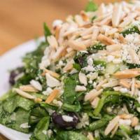 Orzo Spinach Salad · Orzo, spinach, feta, kalamata olives, cucumbers, onions, slivered almonds, garlic, lemon and...