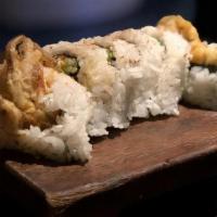 Soft Shell Crab - Roll · softshell crab, krab, avocado, cucumber and masago, topped with ponzu sauce