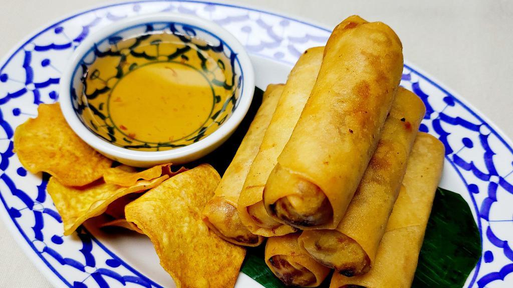 Thai Spring Roll (3) · Fried Spring rolls stuffed with glass noodles,cabbage and carrots served with home make sweet and sour sauce