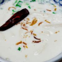 Tom Kha Gai · Hot. Chicken in coconut milk soup with galanga, lime juice, mushrooms, bell peppers, onions,...
