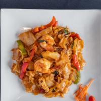 Pad Kee Mao · Hot. Stir fried broad rice noodles with shrimp, chicken, basil leaves, onions, mushrooms, be...