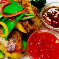 Gai Yang · Thai-style bbq chicken served with sweet and spicy sauce.