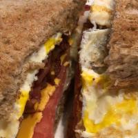 Breakfast Sandwich · One egg, with Dearborn®  ham or Smith bacon or Detroit sausage, and American cheese.