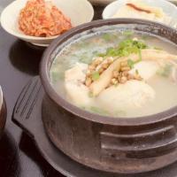 Samgye Tang · Ginseng chicken soup. Chicken stuffed with rice, ginseng and chestnuts.