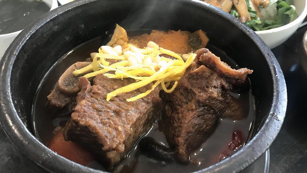 Madang Galbi Jjim · Braised beef short ribs with sweet soy sauce, sweet yellow pumpkin, carrot, mushroom and ginkgo.
