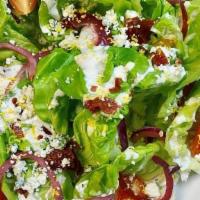 Butter Crisp · butter lettuce, crispy prosciutto, pickled red onions, heirloom tomatoes, bay blue crumbles,...