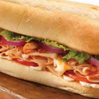 Classic Turkey Sub · Turkey breast and mozzarella cheese, red onions, lettuce, tomatoes and mayonnaise.