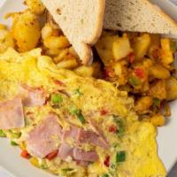 Western Omelette  · with Ham, Onions & Peppers.