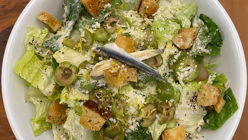 Caesar Salad · Romaine, Castelvetrano Olives, House Croutons, Parmesan, Caesar Dressing*