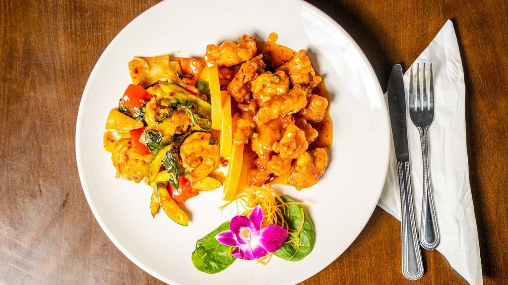 Dragon & Phoenix · Jumbo shrimp with vegetable and general tso's chicken. Served with white rice.