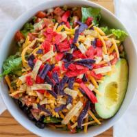 Taco Salad · Romaine, black beans, black olives, house made pico, tortilla strips, cheddar cheese , 1/2 a...