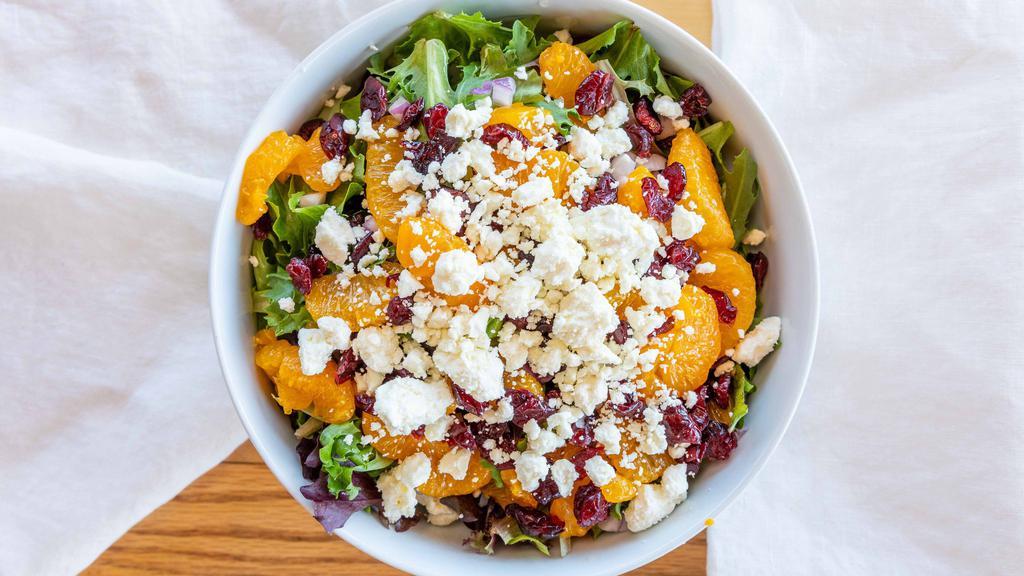Mandarin · Organic mixed greens, red onions, dried cranberries, ,mandarin orange slices, sliced almonds topped with feta cheese. 
Suggested dressing: Sesame ginger