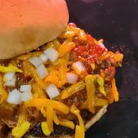 Chili Cheeseburger · We also make chili. Then we put it on the burger with melted Cheddar, diced onions and musta...