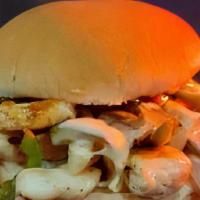 Chicken Tommie Chop · Grilled chicken with grilled onion and bell pepper. Topped with white American and chipotle ...