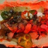 Boss Hog Dog · A bacon wrapped hot dog with cream cheese grilled jalapeño and onions 'and a dash of sriracha.