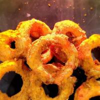 Onion Rings · Extra crispy and hand battered.