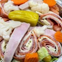 Antipasto Salad · Lettuce, tomatoes, pepperoni, salami, ham, giardiniera, onions & olives.