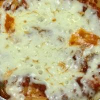Baked Ziti  · Ziti with mozzarella and tomato sauce baked to perfection in our oven.