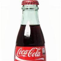 Coca Cola · 355ml glass bottle