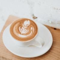 Latte · Costa Rican espresso with velvety micro-foam milk.