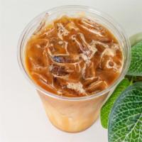 Caramel Macchiato · Caramel flavored milk layered with our Costa Rican espresso shot and drizzled with caramel.