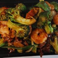 Triple Delight · Shrimp, beet, chicken, broccoli, red and green pepper with mixed vegetables in oyster sauce.