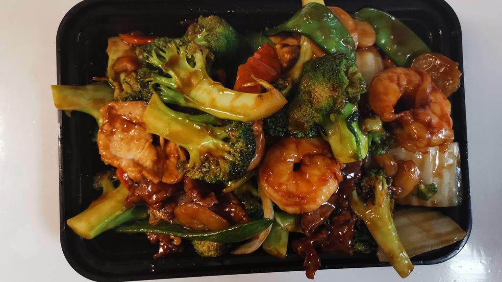 Triple Delight · Shrimp, beet, chicken, broccoli, red and green pepper with mixed vegetables in oyster sauce.