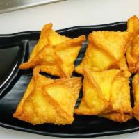Crab Rangoon (Dd) · Seasoned premium crab meat, cream cheese wrapped with thin wonton skin, served with sweet an...