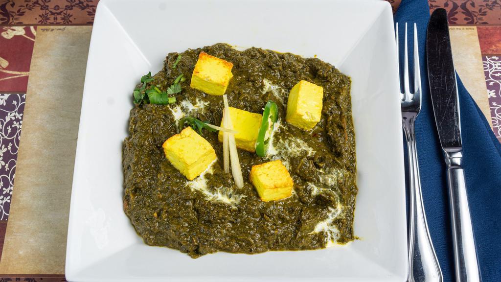 Saag Paneer · Freshly chopped spinach cooked with homemade cottage cheese.