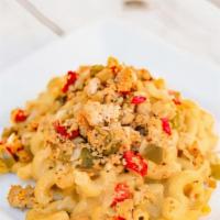 Taco Mac & Cheese · Whole wheat pasta tossed in a creamy pepper jack cheese sauce with ground turkey, red and gr...