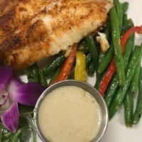 Catfish · Blackened or grilled catfish served with choice of two sides.