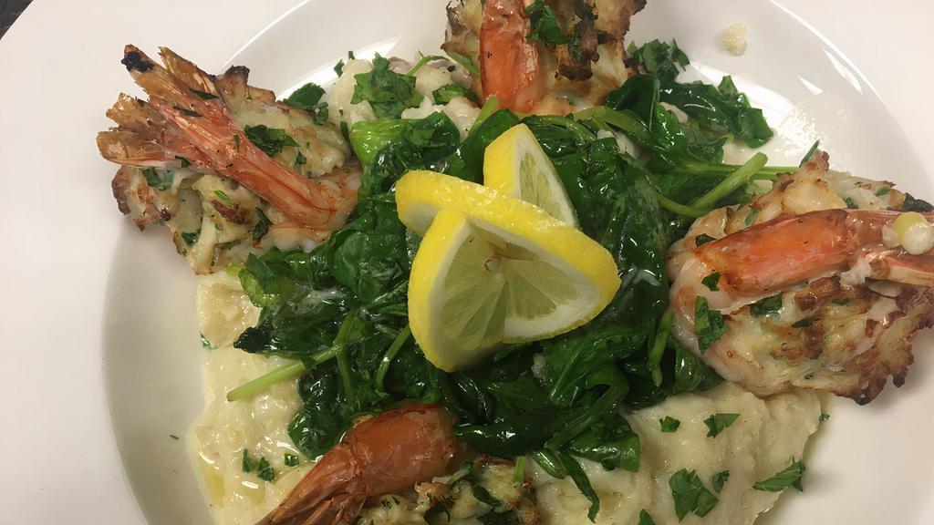 Stuffed Shrimp With Crab Meat · Four large gulf shrimp stuffed with our famous house recipe seasoned super lump crab meat, served with spinach and mashed potatoes.