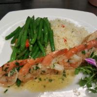 Garlic Shrimp · Jumbo shrimp, flavored infused white wine garlic butter sauce, with rice and vegetable of th...