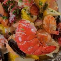 Captain'S Seafood  Boil 1 For 1 · Shrimp, clam, mussels, crawfish, snow crab, sausage, corn on the cobb, potato. Served with c...