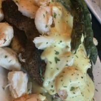 The Oscar · Eight ounces filet topped with grilled shrimp, lump crab, asparagus, and bearnaise, set atop...