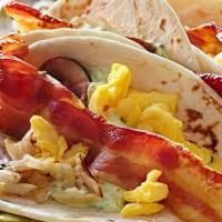 Bacon & Egg Taco · Strip of bacon and scrambled eggs in a flour tortilla.