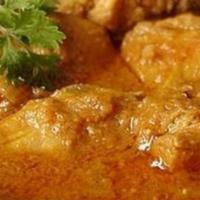 Chicken Curry · Cubes of chicken cooked in a traditional curry sauce.