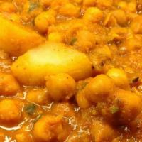 Cholee' · Chickpeas slowly simmered and cooked with onions, tomatoes, and spices.