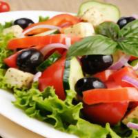 Greek Salad · Romaine lettuce, tomatoes, cucumbers, onions, olives, green peppers, pepperoncini peppers, a...