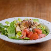 Cobb Salad · Romaine lettuce, grilled chicken, avocado, bacon, diced egg, tomato and bleu cheese crumble ...