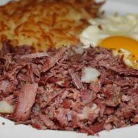 Corn Beef Hash & Eggs (Homemade) · Homemade corn beef hash with two eggs, hashbrowns or country potatoes and toast or biscuit.