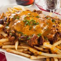 Chili Cheese Fries · Hand cut crispy fries with chili cheese.