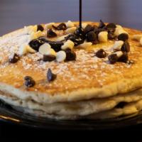 Black & White Pancakes · Chocolate pancakes with white chocolate chips.