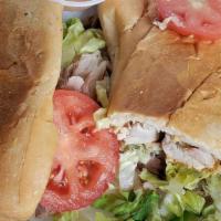 Chicken Sandwich · Sliced rotisserie chicken, mayo, ham, cheese, lettuce and tomato.