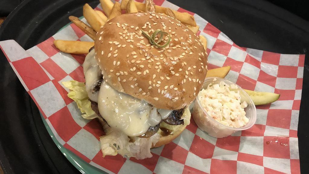 Mushroom Swiss Burger · Grilled angus patty grilled to taste and topped with sautéed mushrooms and melted Swiss.