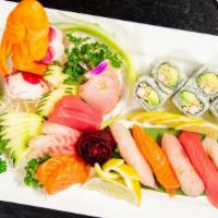 Sushi & Sashimi Combination · 5 pcs sushi and 10 pcs sashimi w. California rolls.