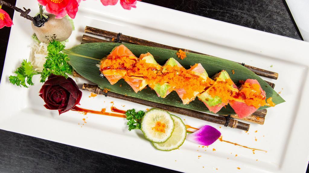 Rainbow Sashimi Roll (6Pc) · In salmon, wrapped with crab, cucumber, avocado, seaweed & eel, middle spicy salmon, top w. salmon, tuna, yellowtail.