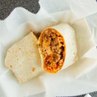 Grande Burrito · Rice, pinto beans, choice of meat, lettuce, cheese, pico de gallo and sour cream wrapped in ...