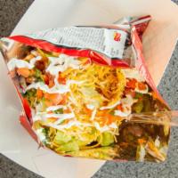 Taco In A Bag · Beef, lettuce, cheese, pico de gallo and sour cream served in a single serving size Doritos ...